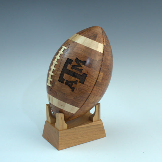Wooden football with Texas A&M branding